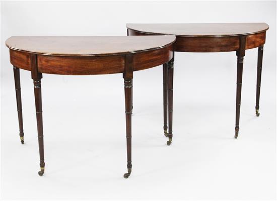 A pair of George III mahogany demi lune tables, W.3ft 6.5in.